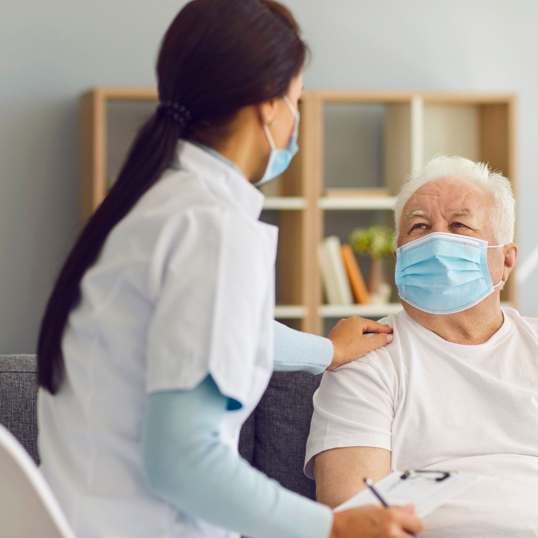 Nurse helping senior at home