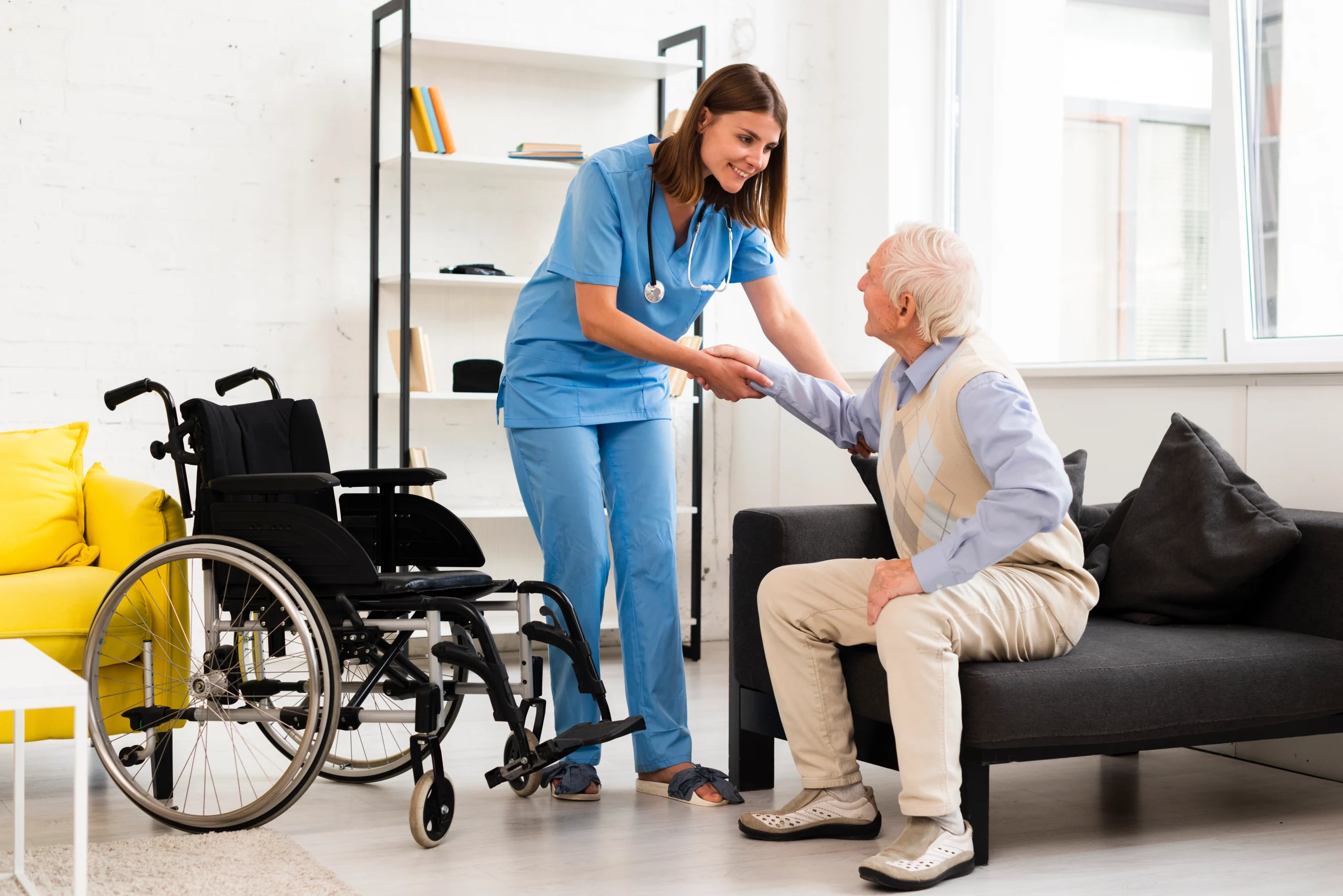 long-shot-nurse-helping-old-man-getting-up-scaled.webp